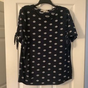 Loft blue knit top with white flower design